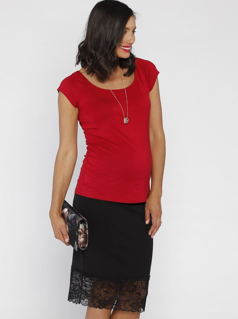 Side view - A woman in Stretchy Maternity Black Skirt with Lace Details (10088240838)