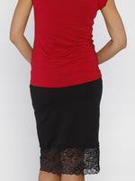 Back view - A woman in Stretchy Maternity Black Skirt with Lace Details (10088240838)